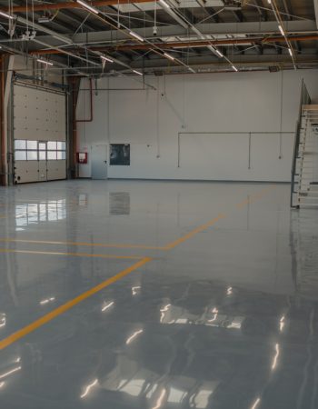 Epoxy,And,Waxed,Flooring,With,Colorful,Signage,In,Car,Service